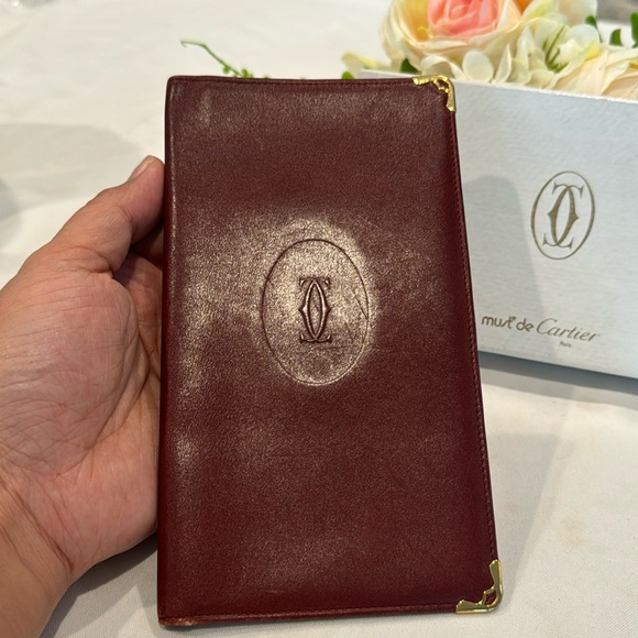 Cartier Handbags - Authentic Cartier bifold wallet